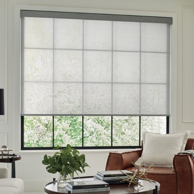 White motorized shades in a living room