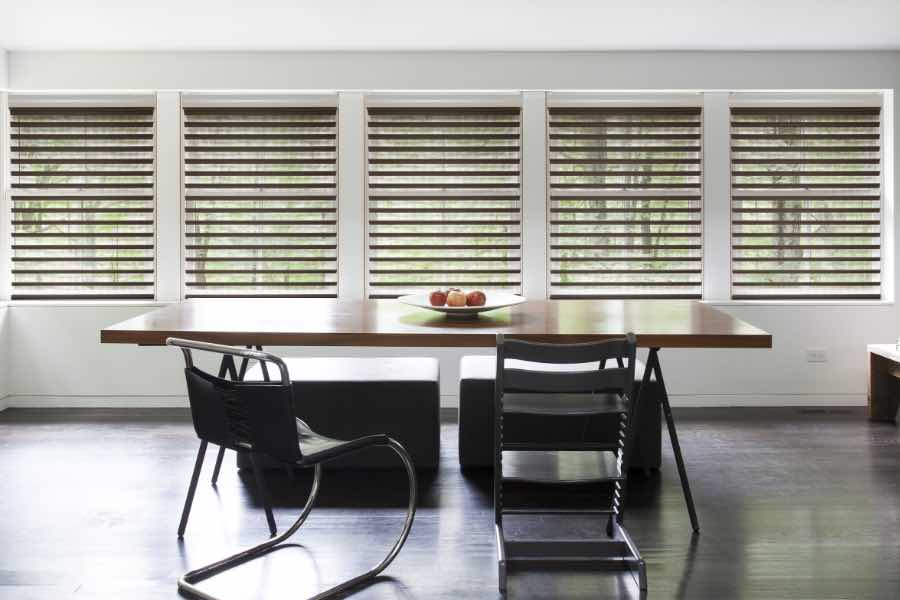 Brown blinds on dining room windows