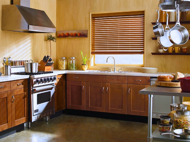 Brown wood blinds on a kitchen window