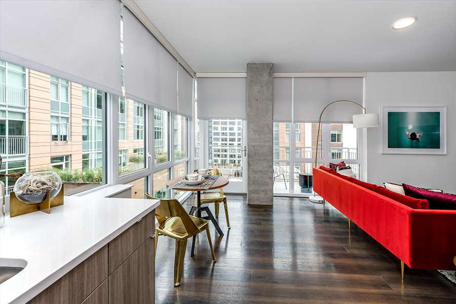 White motorized shades in a city corner waiting room