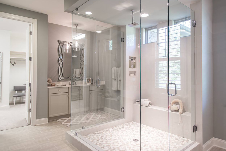 Polywood shutters on a window in a glass shower