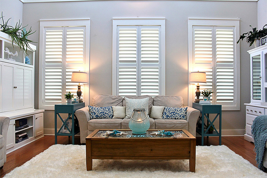 Polywood shutters on three living room windows