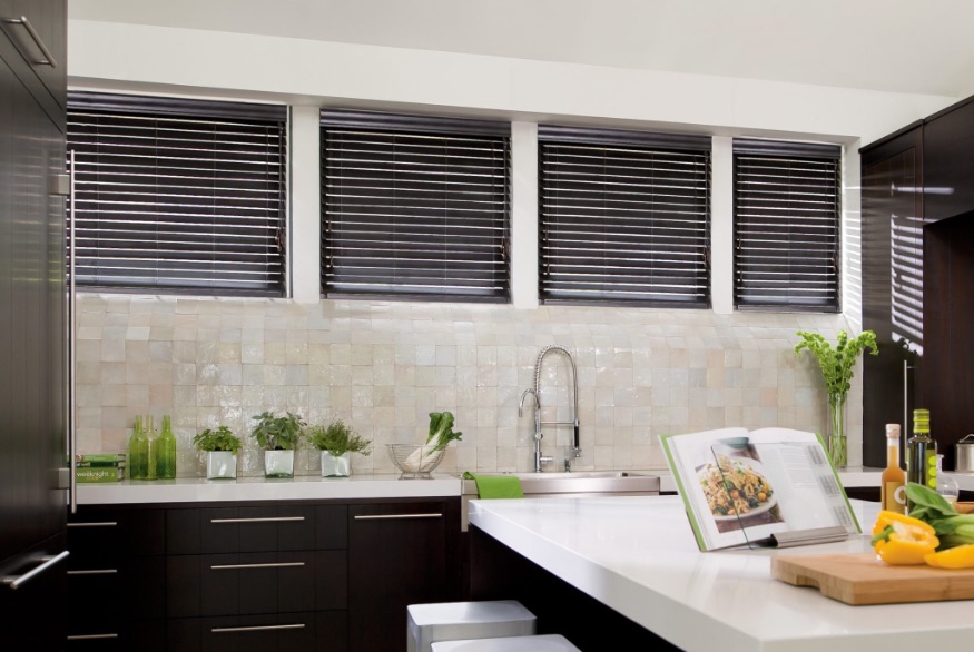 Dark basswood blinds in a kitchen