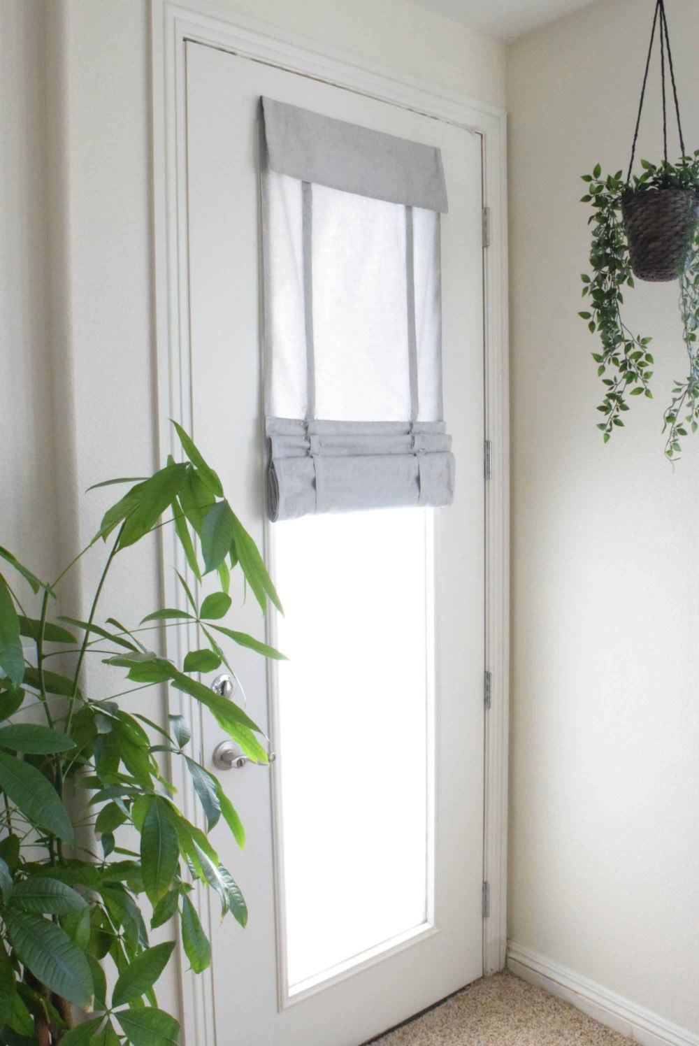 light gray half up tumble shade