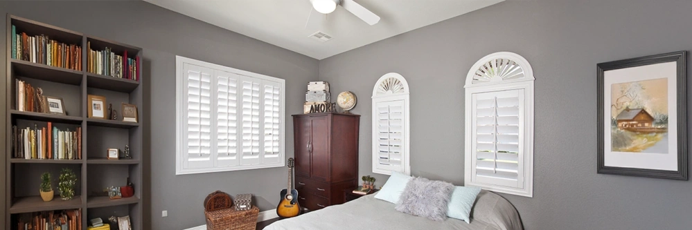 Arched shaped windows in a teen bedroom