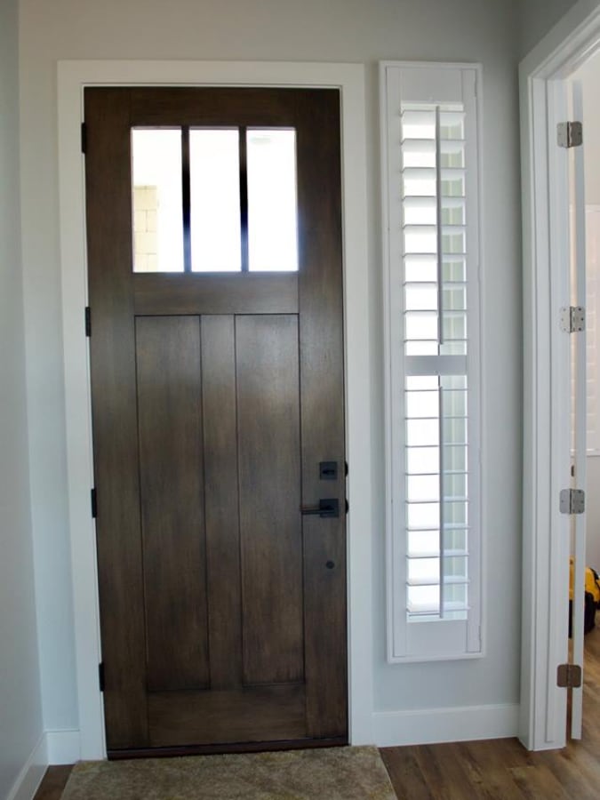 The Polywood shutter can also cover the entire sidelight window. Door with sidelights