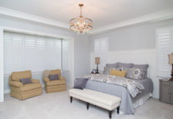Plantation shutters in a bedroom