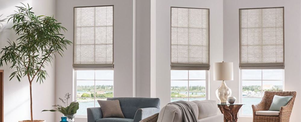 beige shades in custom small windows inside a living room