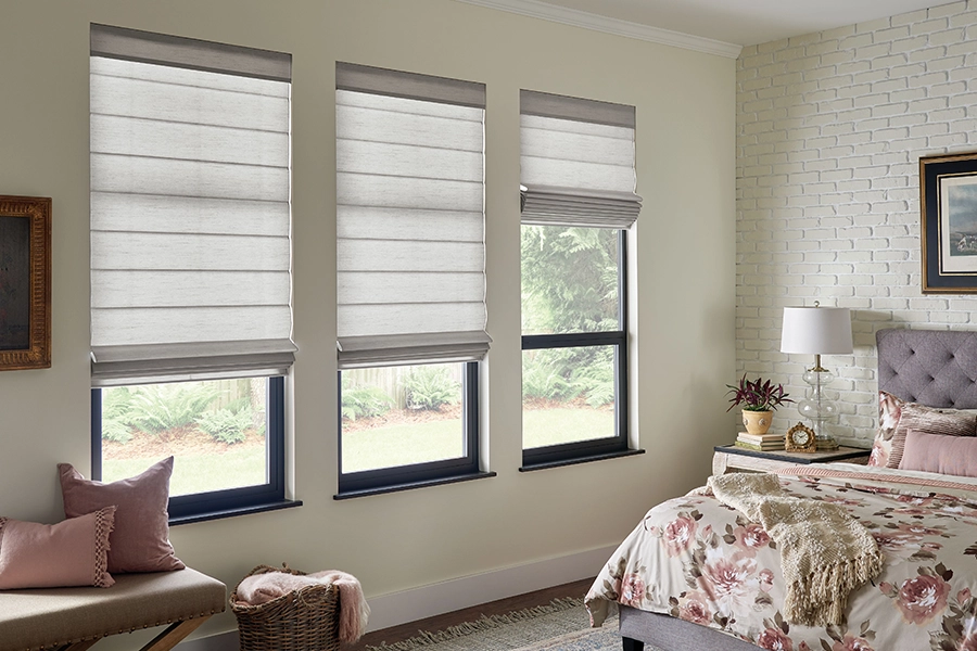 You can get several years out of your window shades when you install them in a dry area. Gray Roman shads on bedroom windows