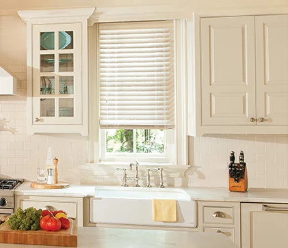 hardwood blinds in beige above a kitchen sink